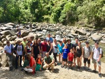 tourists near river